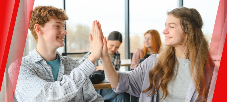 Students giving high-five